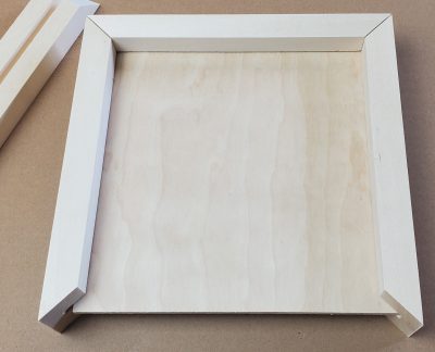 Unfinished wood farmhouse sign kit with 4 frame sides and backer for painting or staining